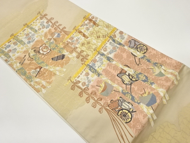 色打掛に御所車・糸巻き・和楽器模様織出し袋帯